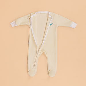 Enterizo Jacquard Crema Dinosaurio